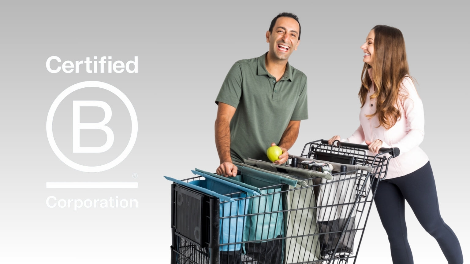 "Certified B Corporation" Logo. Founders, Farzan and Jen, posing and smiling with Lotus Trolley Bag in grocery cart.